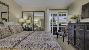 Bedroom with French Doors Leading to the Private Patio