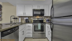 Enjoy preparing your meals on this remodeled, clean and fully equipped kitchen.