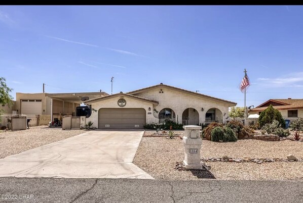 Lots of parking, fenced yard and front porch.  