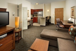 Sink into the cozy sofa after a day exploring the area.