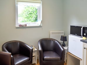 Living area | Shepherds Hut 3 in Kent - The Shepherds Huts at Laddingford, Laddingford, near Maidstone