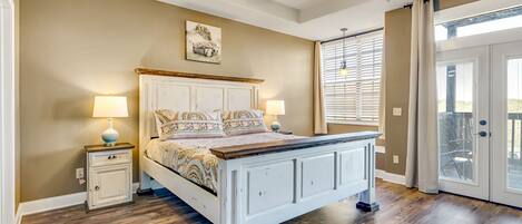 Master bedroom with king size bed, private access to deck and ensuite bathroom