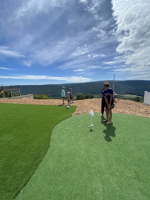 Practice your putting game; While the kids play!