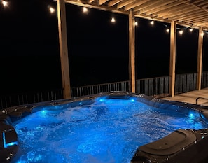The hot tub seals the deal to help you relax. 