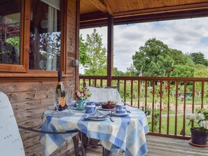 Wonderful covered verandah | Lakeside Cabin, Kingston Blount, near Thame