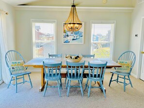 Dining area seats 8 comfortably.