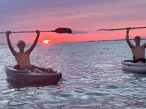 Kayak from our back porch out to the bay in just a few minutes. So much fun!