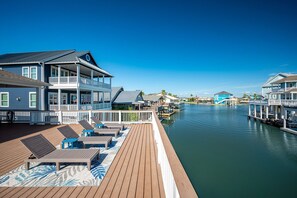 Multiple sitting areas inside/out. Loungers provided on the main deck
