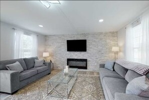 The spacious living area includes an electric fireplace for cool nights, and a Roku-ready smart TV. Bring your Roku for streaming access, The Oasis has Wifi!