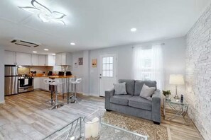 A wide-open floor plan creates a great social space between the living area, dining area, and kitchen.