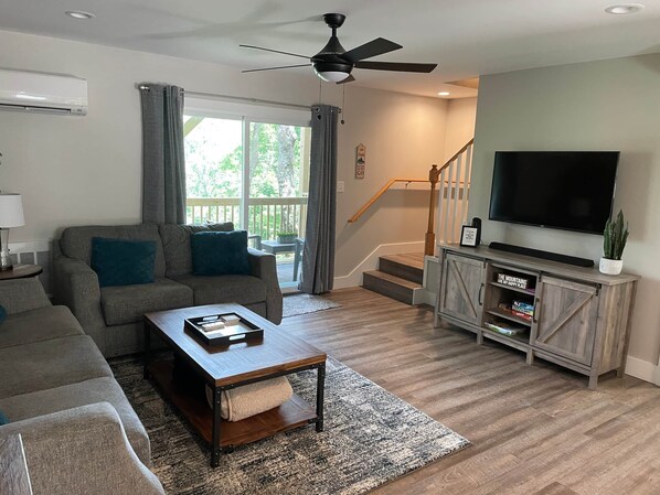 Comfy couches, smart tv, and a great view make for a perfect way to recharge.