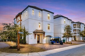 6-seat Golf Cart FREE during your stay! 2 minutes to the beach. Sleeps 20, 7 bedrooms, 7.5 bath, and 12 beds. Game room and bunk rooms. Private entrance from the back porch to the heated pool!