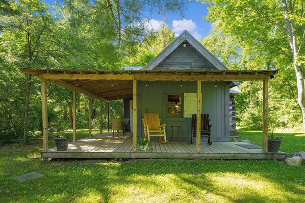 Covered porch with multiple seating areas