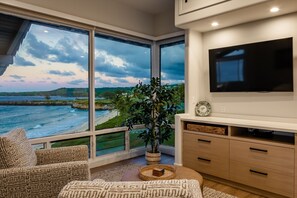 Moody sunset views from the master bedroom lounging area at dusk