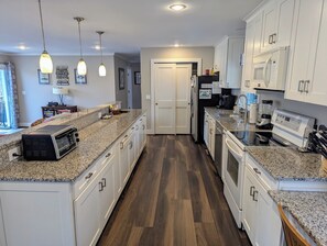 Newly renovated kitchen, with new refrigerator with filtered water/ice