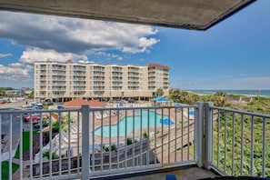 This side balcony gives you both pool and ocean views, offering the best of both worlds for your downtime.