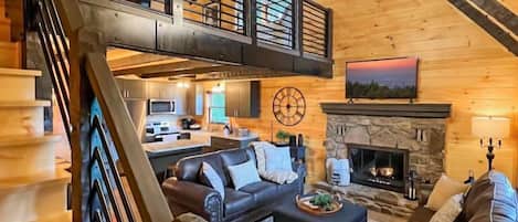Angled Photo Of Living Room And Loft.