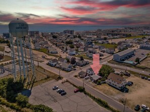 Aerial views - Walkable to the beach, off-street parking for up to 4 cars, private fenced in yard.