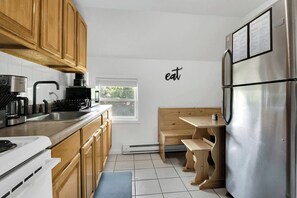 Kitchen With Updated Black Fixtures, Pots, Pans, Flatware, Plates, Glasses including Stemless Wine Glasses!