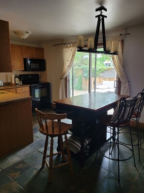 Kitchen with a walk out to the deck