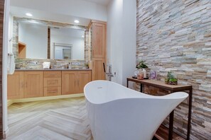 Luxurious Custom Master Suite double Vanity sinks, and relaxing soaking tub. 