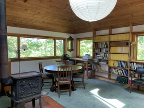 Table for dining and working. The cottage has its own WiFi.