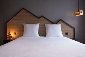 Relax on the comfy bed after a day outside.