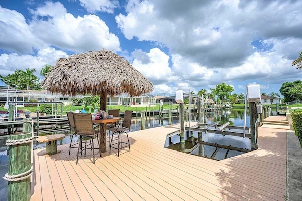 Enjoy Amazing Sunset Views from this Sweet Retreat Tiki Hut Dock