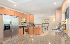 Kitchen with View of Pool Area