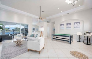 Living Room with Game Table Air Hockey, Ping Pong and Pool