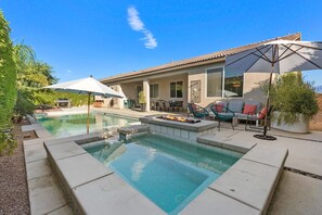 Hot Tub and Pool Backyard with Gril