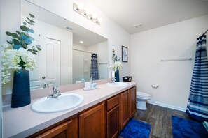 Start your mornings with ease in this bright, spa-inspired bathroom featuring a double vanity and calming blue accents -- refresh and recharge in style~