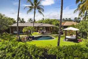 Spacious backyard with private pool, spa, covered daybed & luscious lawn