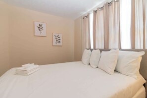 Minimalist Bedroom with set of pillows