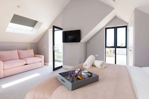 The beautiful master bedroom has a south facing balcony.