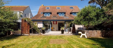 The beautiful 5BR East Wittering house offers a charming, family-friendly getaway just 2 minutes from the beach