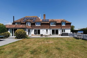 The home has a lovely garden space and decking.