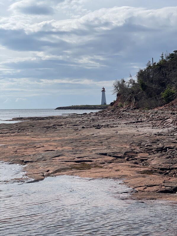 Beachfront Point Prim Cottage - Walk to the Lighthouse during low tide.