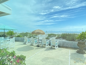RELAX OUT BACK WITH ROCKING CHAIRS OVERLOOKING THE BEACH/OCEAN