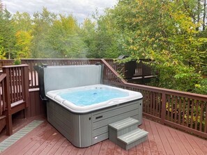 Private Hot Tub surrounded by natural beauty – perfect after a day of adventure.