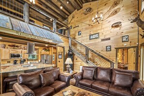 View of the Living & Family area/and stairs to 2nd floor loft and bedrooms.