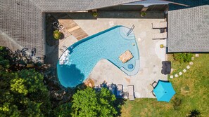 Outdoor Pool with Enclosed Patio Game Room