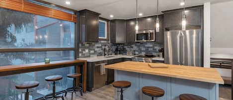 Brand new remodeled kitchen.  High end appliances w/views up the mountain.
