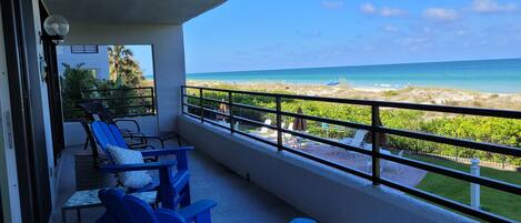 Main Balcony to beach view, a front seat to amazing sunsets.