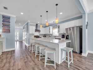 Classic & Elegant Stainless Steel Appliance Filled Kitchen, Large Granite Island