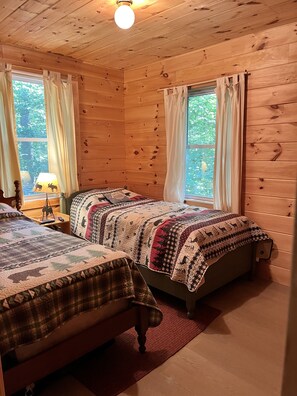 First floor bedroom with two twin beds