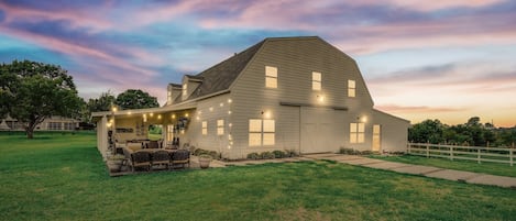 Featuring 5 bedrooms and 3 bathrooms, let this rustic charming barndominium be your next home away from home!
