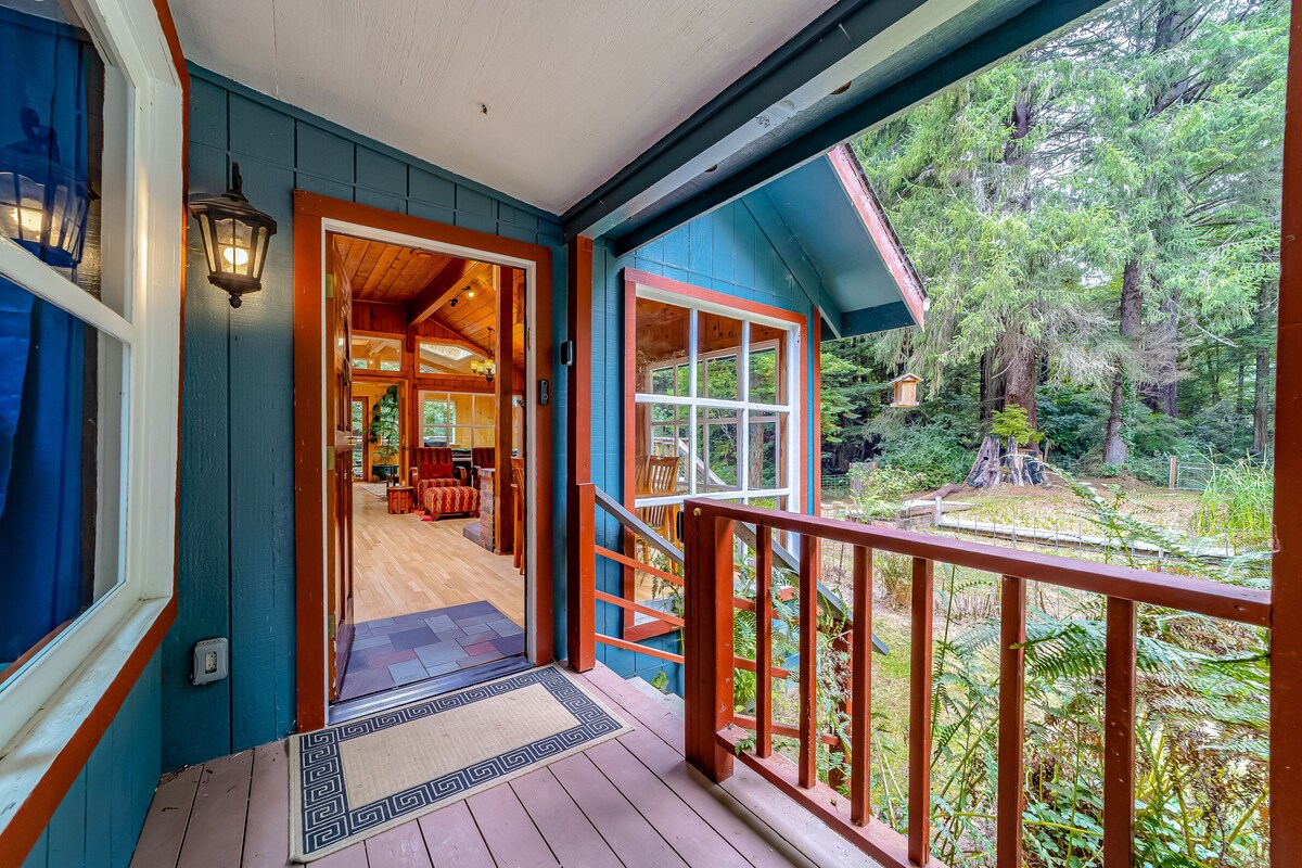 Secluded forest home with deck, private setting, woodstove, WiFi, & patio