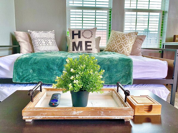 Find your cozy corner in this inviting living room. The warm and welcoming atmosphere makes it the perfect spot to relax and recharge