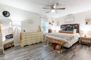 Sleep like a royal family member on the queen-size bed found in the master bedroom.